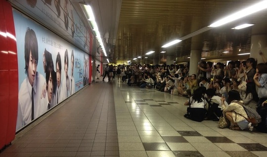 arashi shinjuku station ad poster billboard fans oral sex