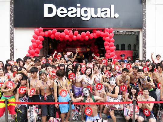 desigual seminaked party bikini swimsuit swimwear event harajuku tokyo store naked customers flash mob