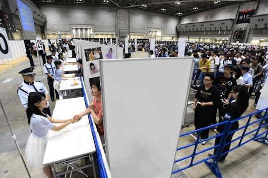 akb48 handshaking meet and greet event big sight increased security body checks