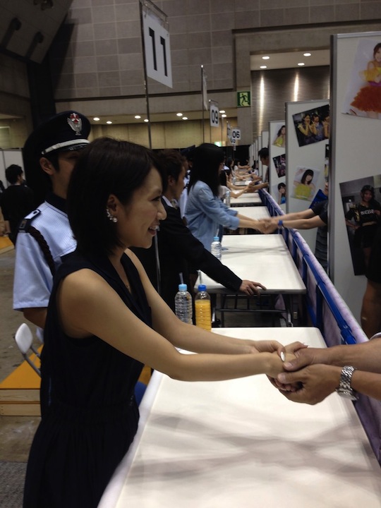 akb48 handshaking meet and greet event big sight increased security body checks