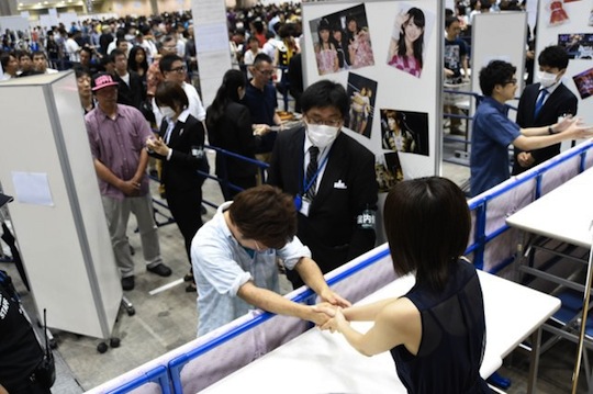 akb48 handshaking meet and greet event big sight increased security body checks