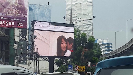 jakarta indonesia rush hour japanese porn av hacked billboard display screen advertising plays sex