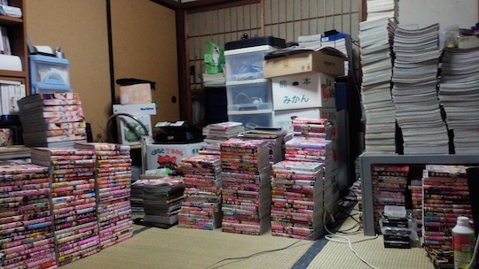 japan crushed death pile stack porn magazines