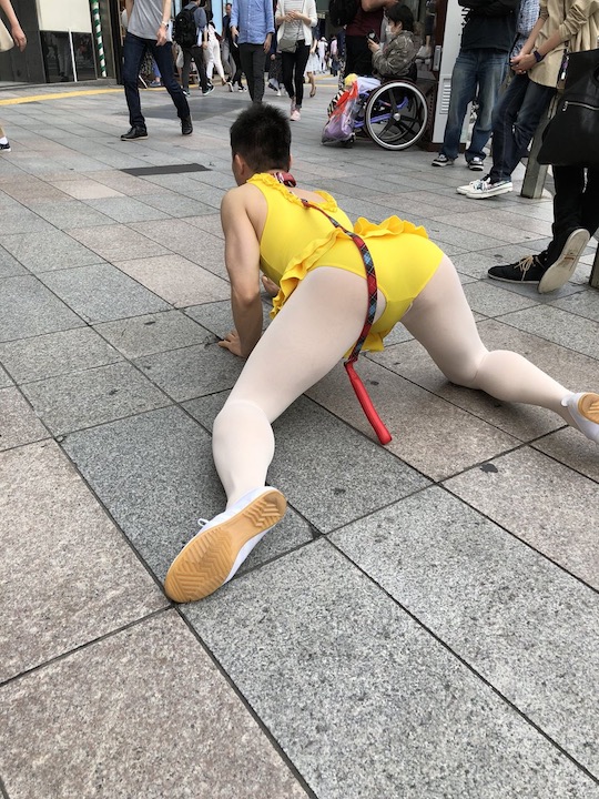japan fetish slave leotard strange man tokyo street public nudity performance