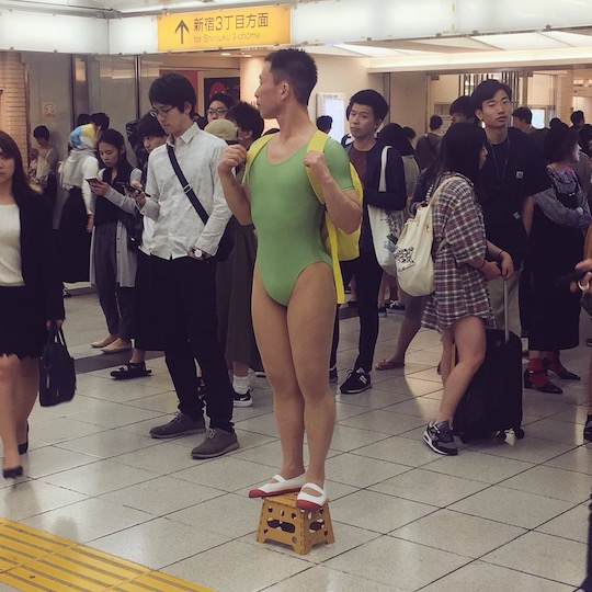 japan fetish slave leotard strange man tokyo street public nudity performance